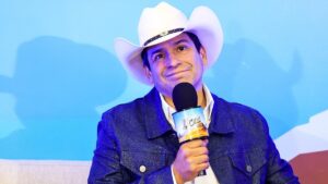 Bobby-pulido-holds-a-microphone.jpeg
