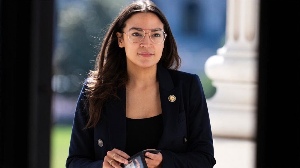 alexandria-ocasio-cortez-walks-into-House.jpeg