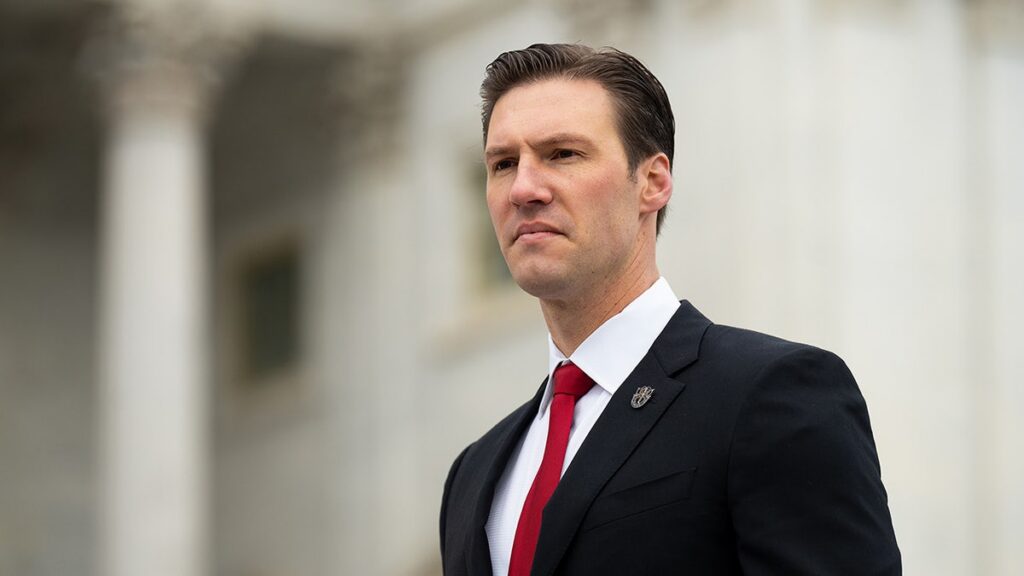 patt-harrigan-walks-down-capitol-steps.jpg